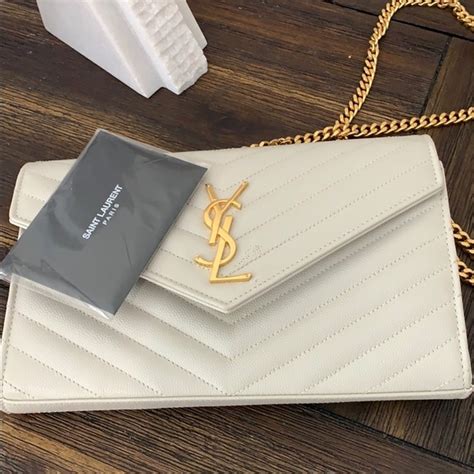 white ysl handbag|ysl white clutch bag.